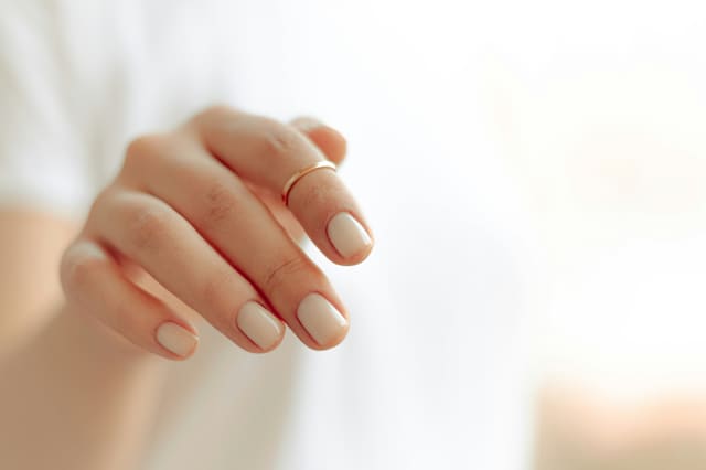 Short natural nails in sheer nude gel